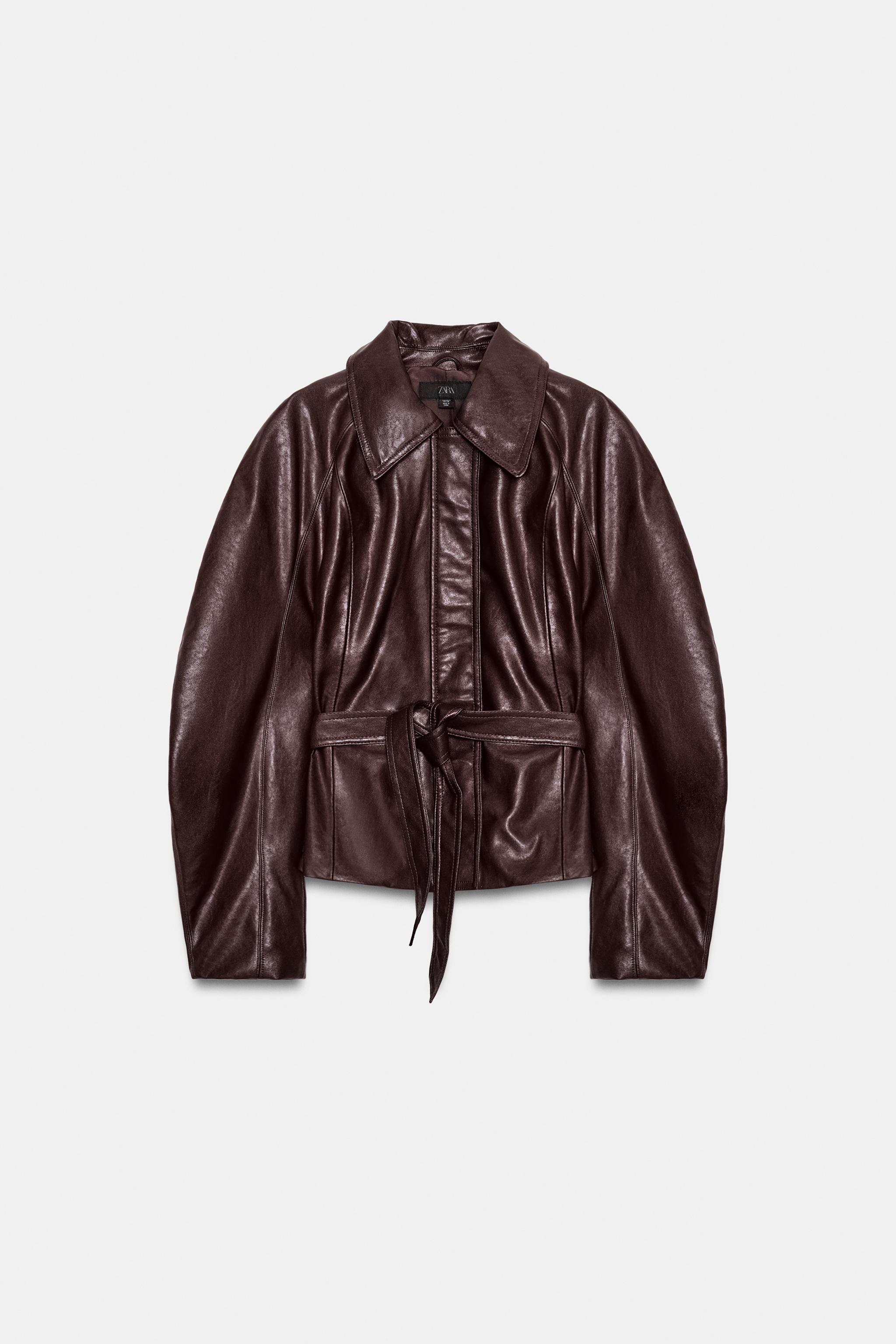 VESTE À CEINTURE EN MATIÈRE SYNTHÉTIQUE